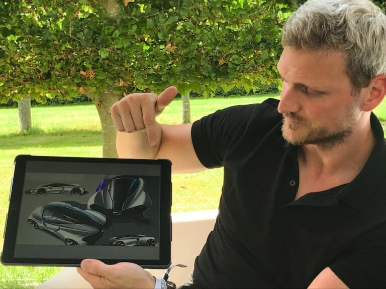 New McLaren GT With Rob Melville In McLaren Secret Garden at FoS