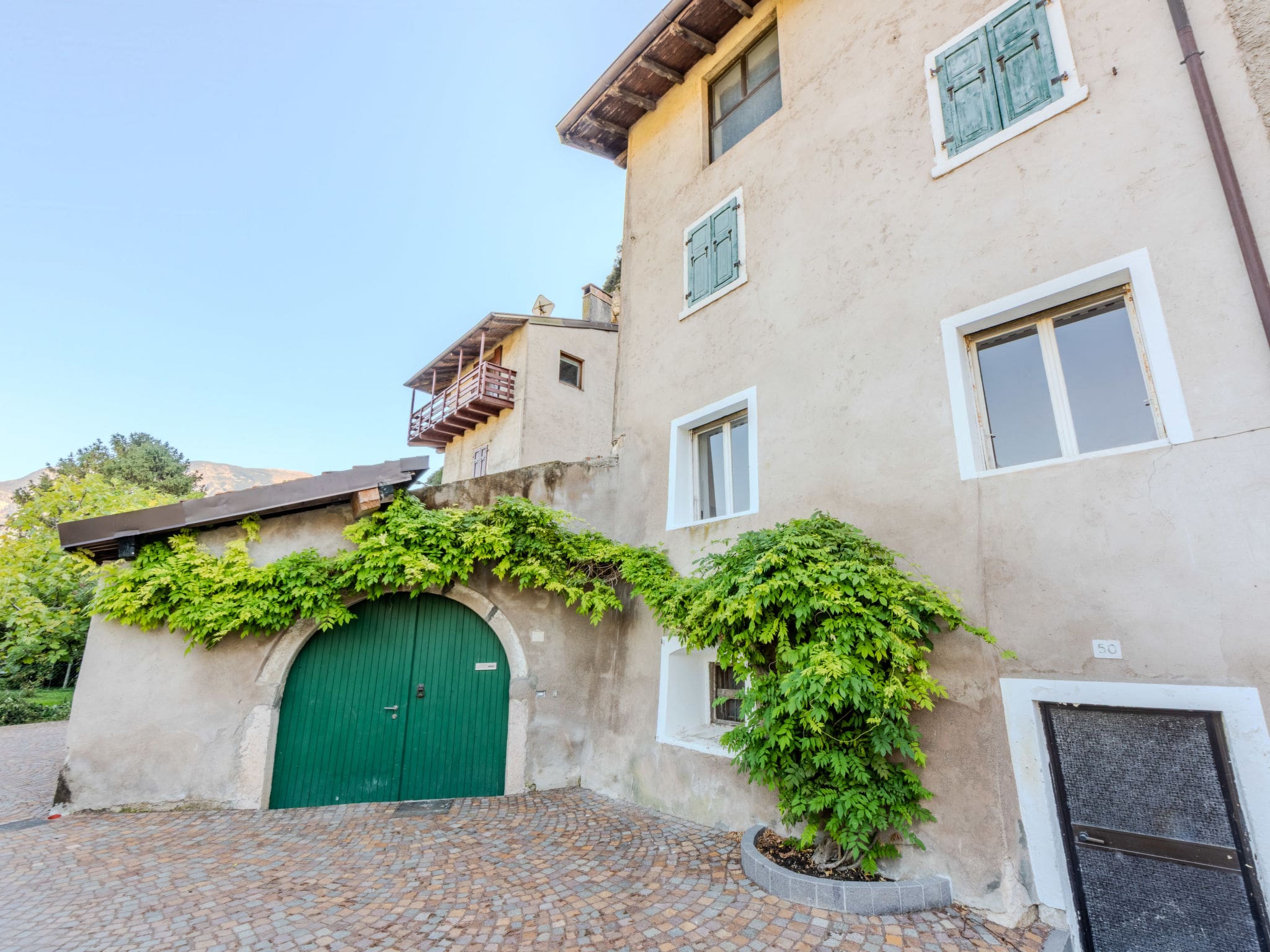 Casa Sarca Arco: Rustic 4-Bedroom Family House with Mountain Views Near Lake Garda in Northern Italy