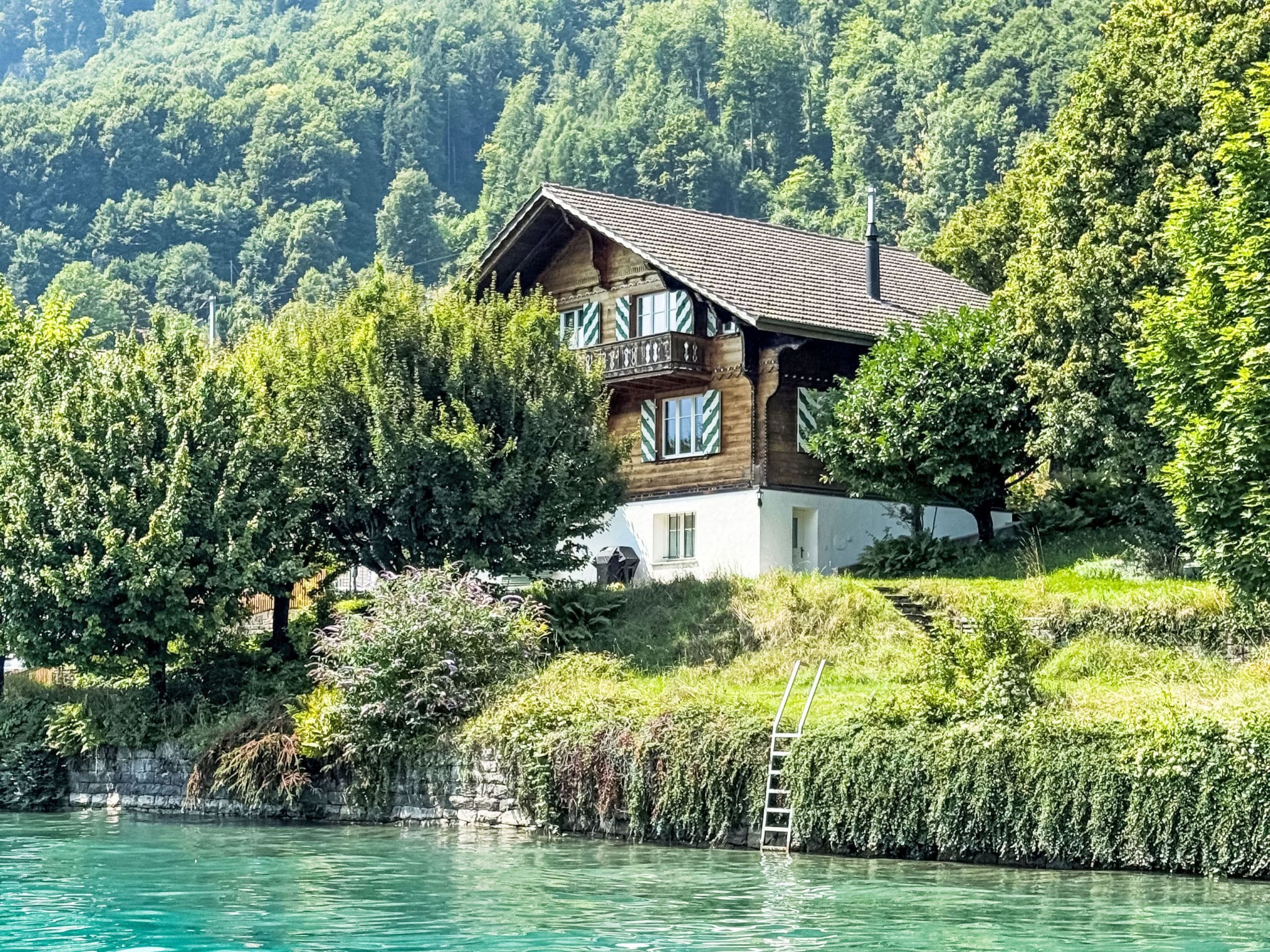 Chalet Foehn Niederried: Stunning 5-Bedroom Lakefront Chalet with Mountain Views and Private Garden in Swiss Alps
