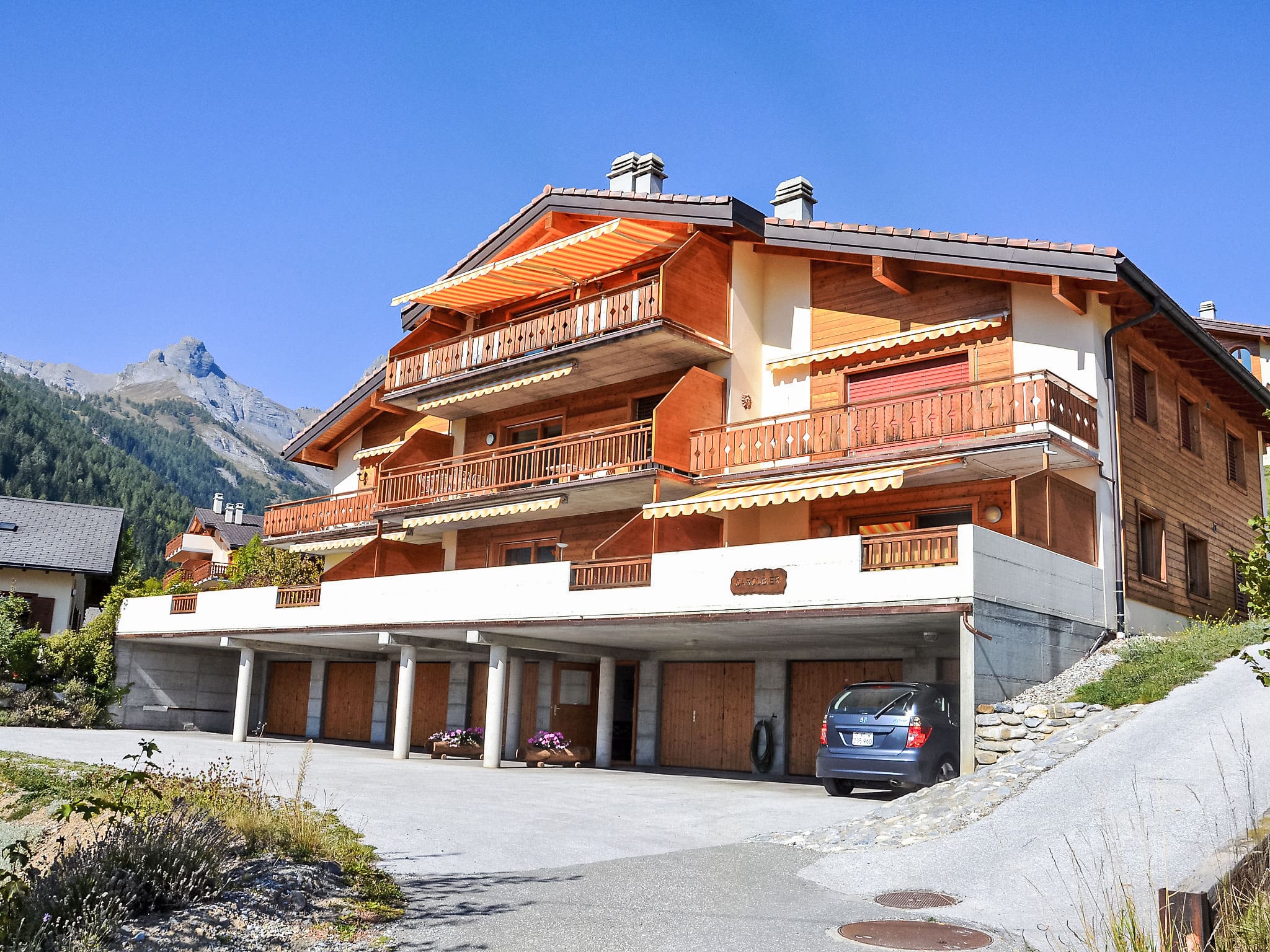 Chalet Moiry Ovronnaz: Elegant 2-Bedroom Mountain Chalet with Stunning Valley Views and Thermal Spa Access in Swiss Alps