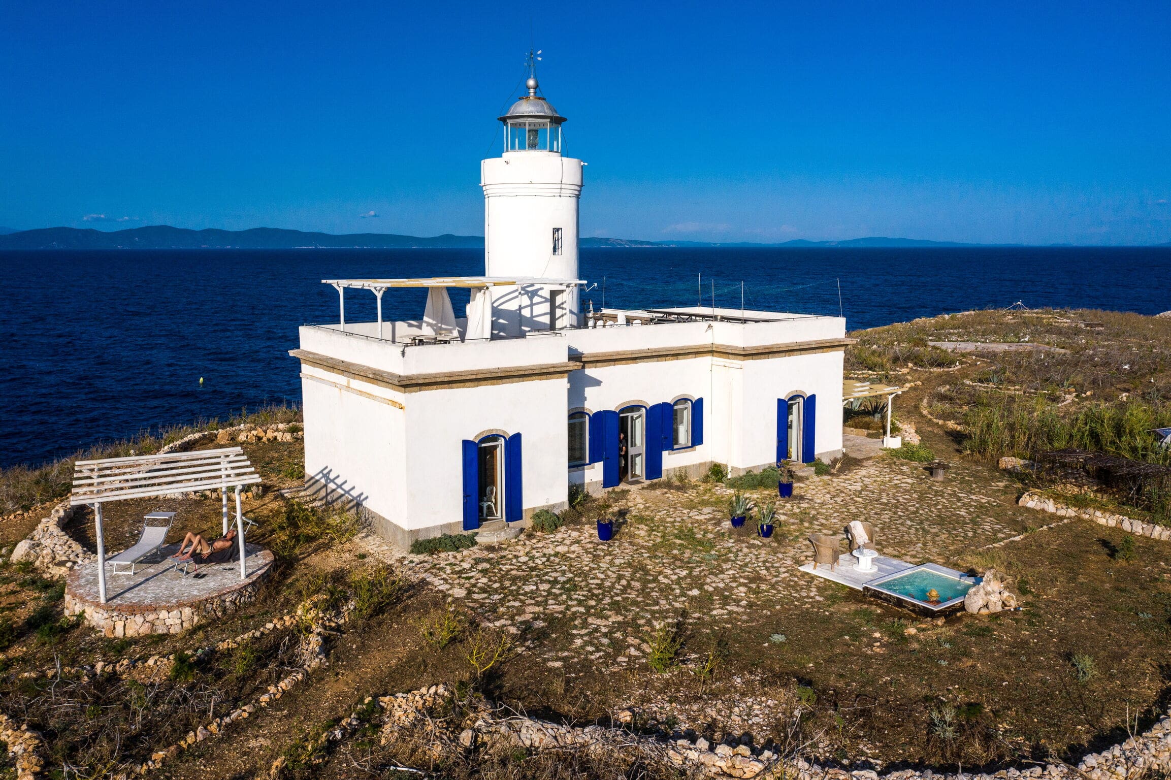 Faro del Mare: Historic Lighthouse Private Island Rental Grosseto with Chef Service