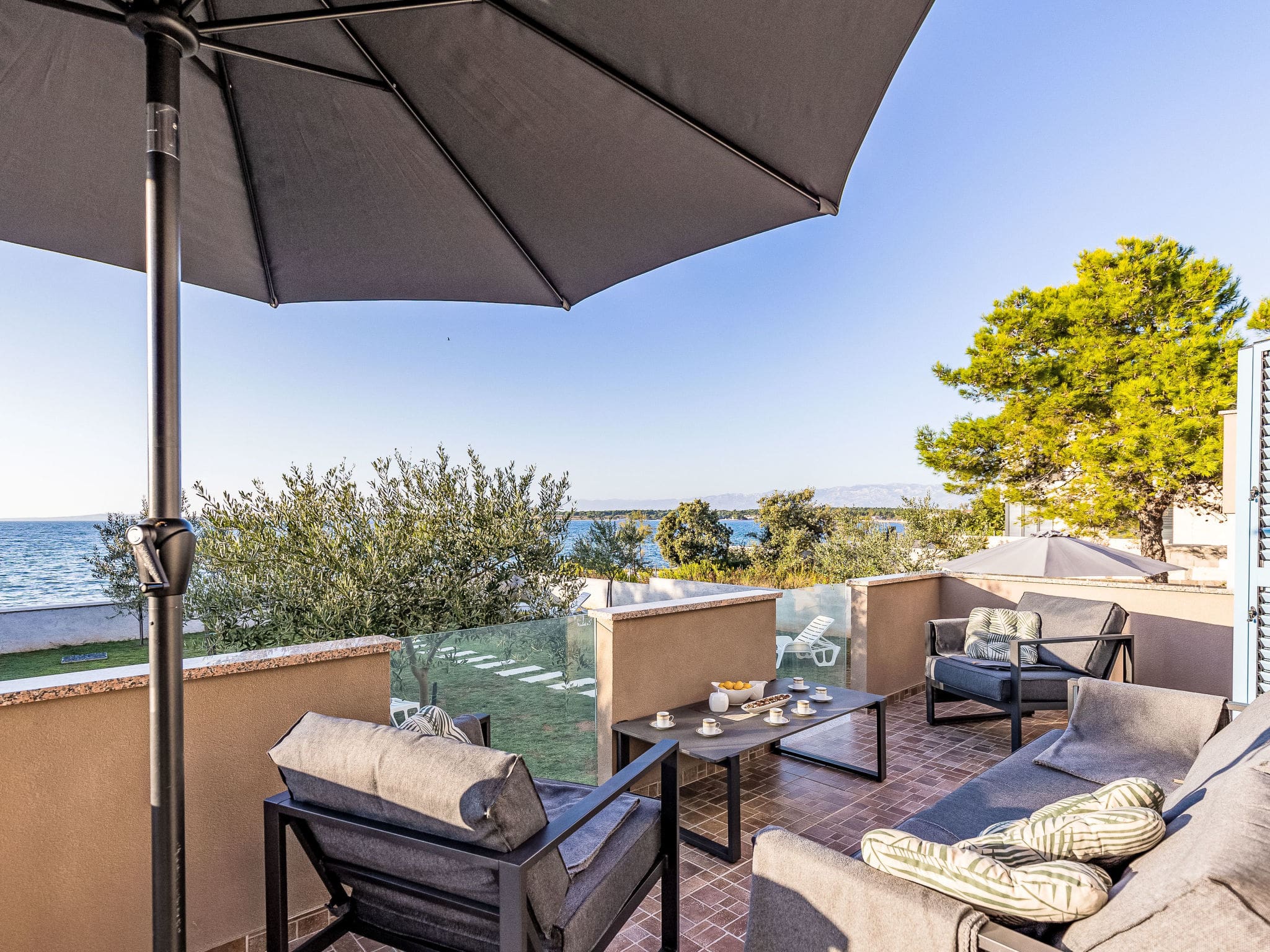 Kuca Jugo Zaton: Stunning Three-Bedroom Beachfront House with Sea Views and Private Terrace in Croatia