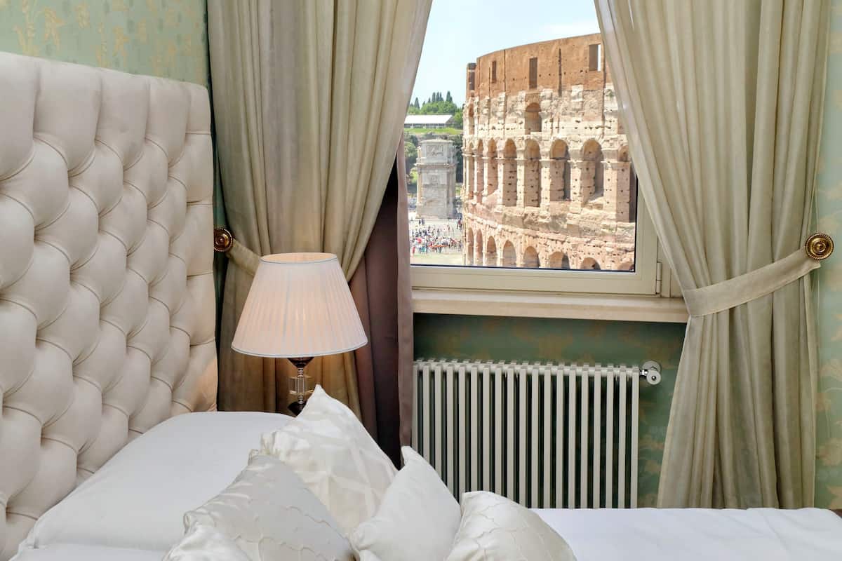Palazzo Ludus Rome: Elegant 2-Bedroom Apartment with Colosseum Views, Rome